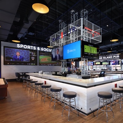 Center bar at Sports & Social St. Louis, perfect spot to catch a Cardinals or Blues game.
