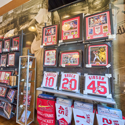 Inside of Cardinal Authentics store at Ballpark Village, items include jerseys, hats, apparel, gifts, memorabilia, and more.