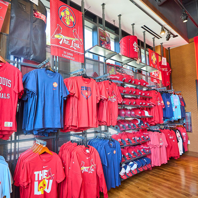 Inside of Cardinal Authentics store at Ballpark Village, items include jerseys, hats, apparel, gifts, memorabilia, and more.