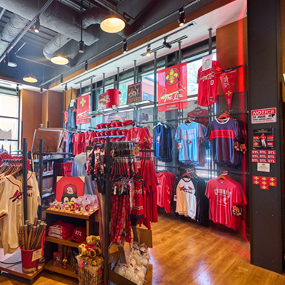 Inside of Cardinal Authentics store at Ballpark Village, items include jerseys, hats, apparel, gifts, memorabilia, and more.